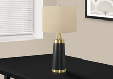 28" Black and Gold Metal Cylinder Table Lamp With Beige Drum Shade