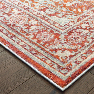 4' X 6' Grey And Orange Oriental Power Loom Stain Resistant Area Rug